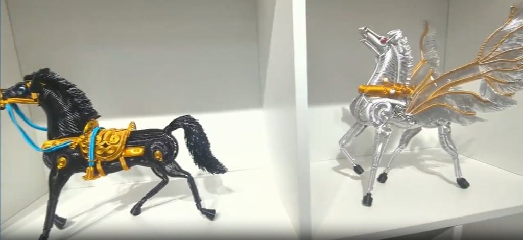 The latest piece to celebrate Year of the Horse is just one of many, such as the two above, which have been made by Yang. - Photo: ChinaNews