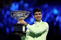Tennis-Alcaraz denies Djokovic at Melbourne Park fortress to complete career Grand Slam
