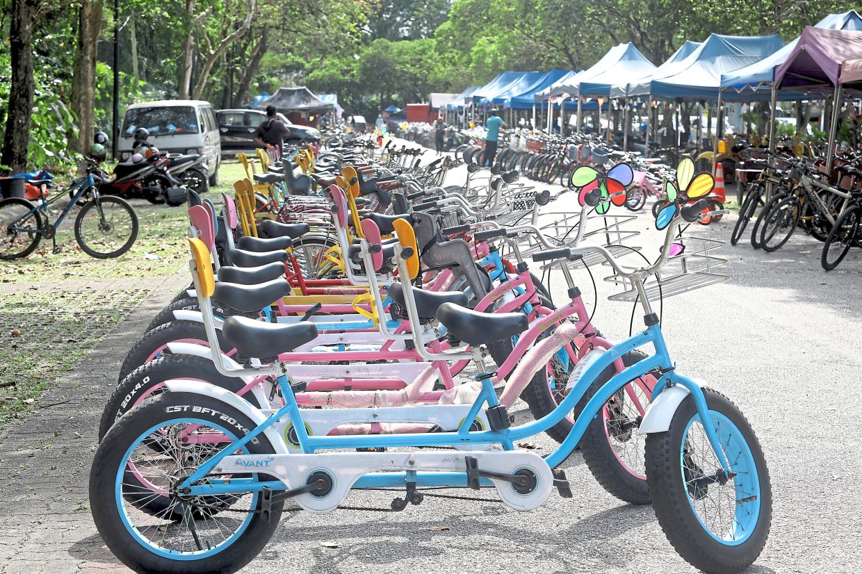Vendors are allowed to offer up to 50 bicycles for rent at a time. There are currently 30 legal operators. — Photos: IZZRAFIQ ALIAS and AZLINA ABDULLAH/The Star