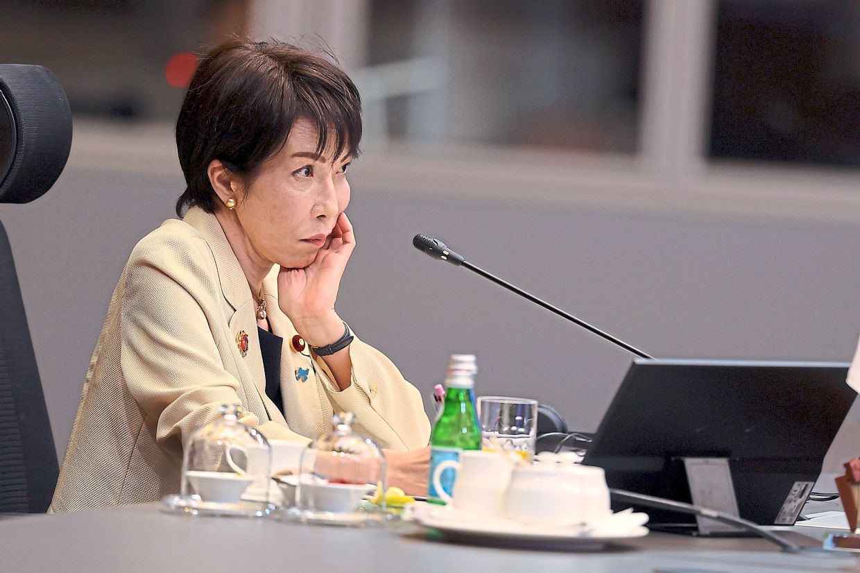 Takaichi talks up weak yen