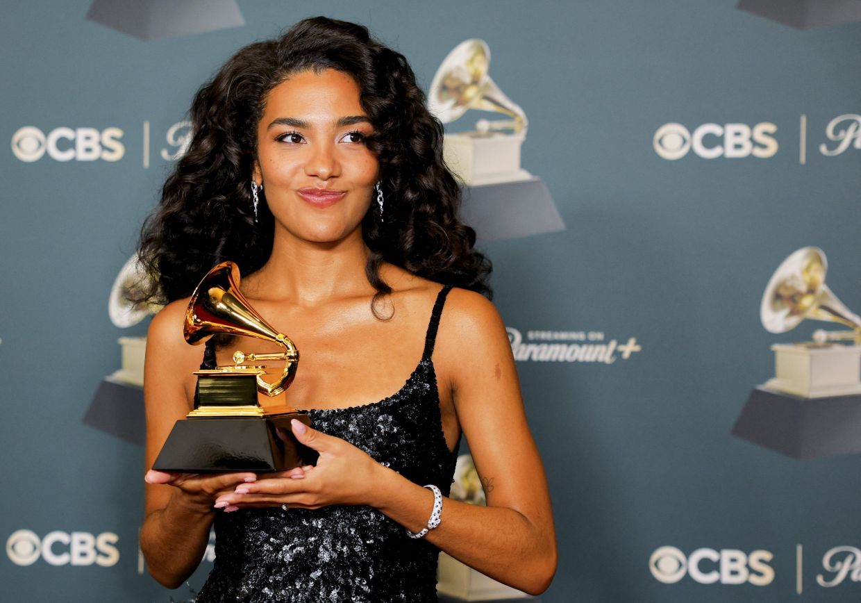 Olivia Dean poses with the Best New Artist award during the 68th Annual Grammy Awards. Photo: Reuters