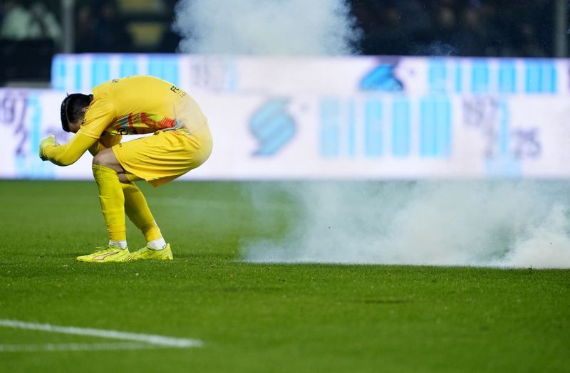 Soccer-Inter's Marotta condemns flare incident in win at Cremonese