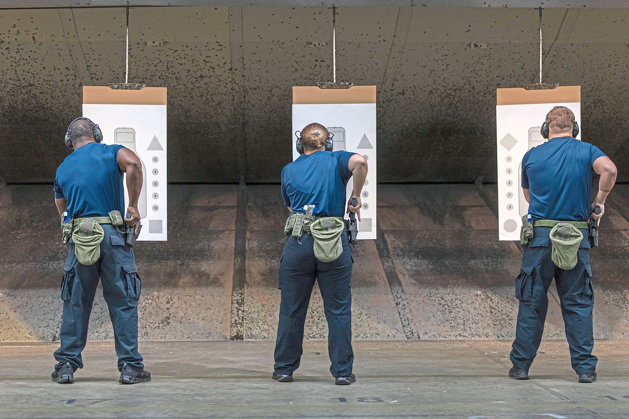 ICE recruits train with firearms at a training center at the Federal Law Enforcement Training Center in Glynco. — Audra Melton/The New York Times
