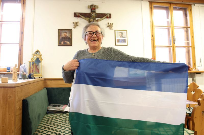 Olympics-Ladin flags fly high in Cortina as minority community seeks more recognition