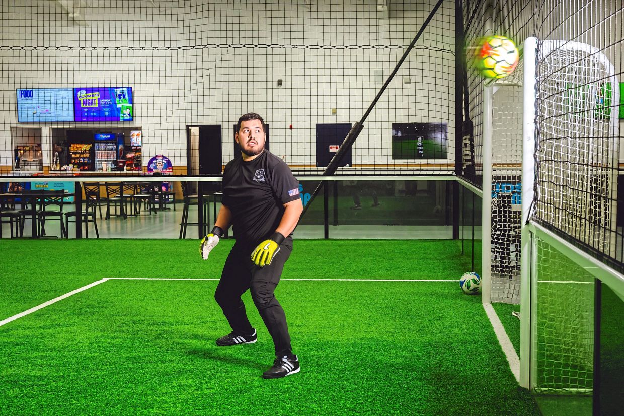 Delgado warms up before a Man v Fat league game.
