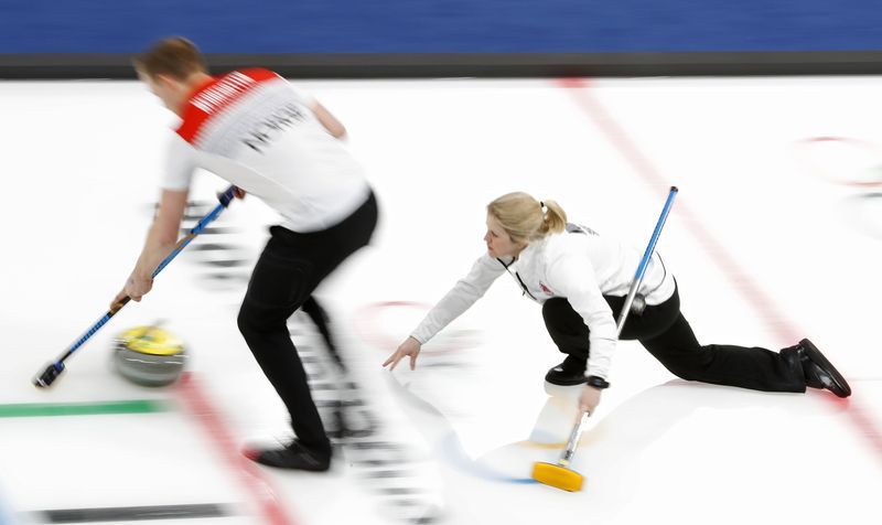 Olympics-Curling-Married mixed doubles teams balance demands of competition with family life