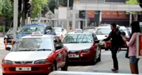 Malaysian taxis in Singapore must install on-board unit ahead of 2027 rollout