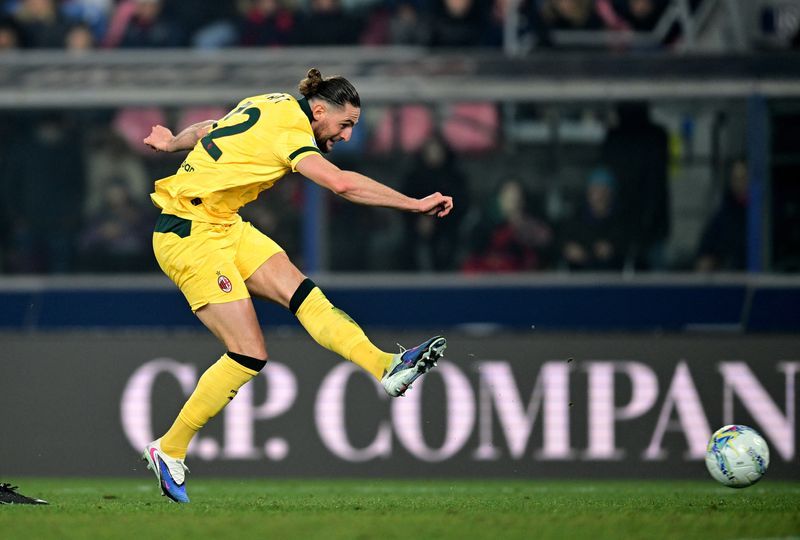 Soccer-AC Milan close gap on city rivals Inter after 3-0 win at Bologna