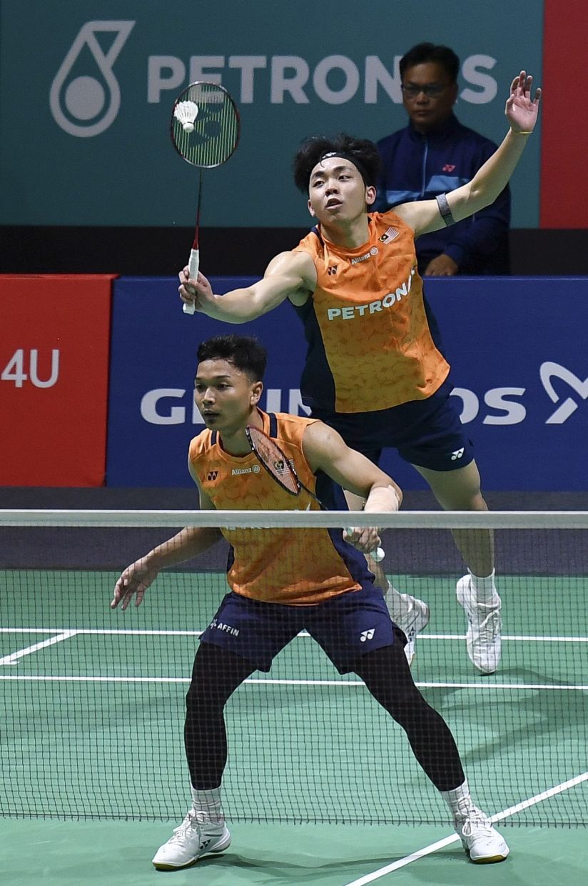 No pressure: Wan Arif Wan Junaidi-Yap Roy King are among the highest-ranked players in the team. They say enjoying the matches would help settle nerves. — IZZRAFIQ ALIAS/The Star