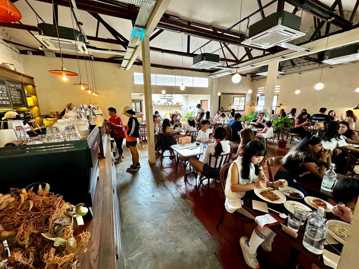 Grumpy Bagels Imbi has sustained its initial virality and nearly two years after it opened, it is still packed to the rafters. — LOW LAY PHON/The Star