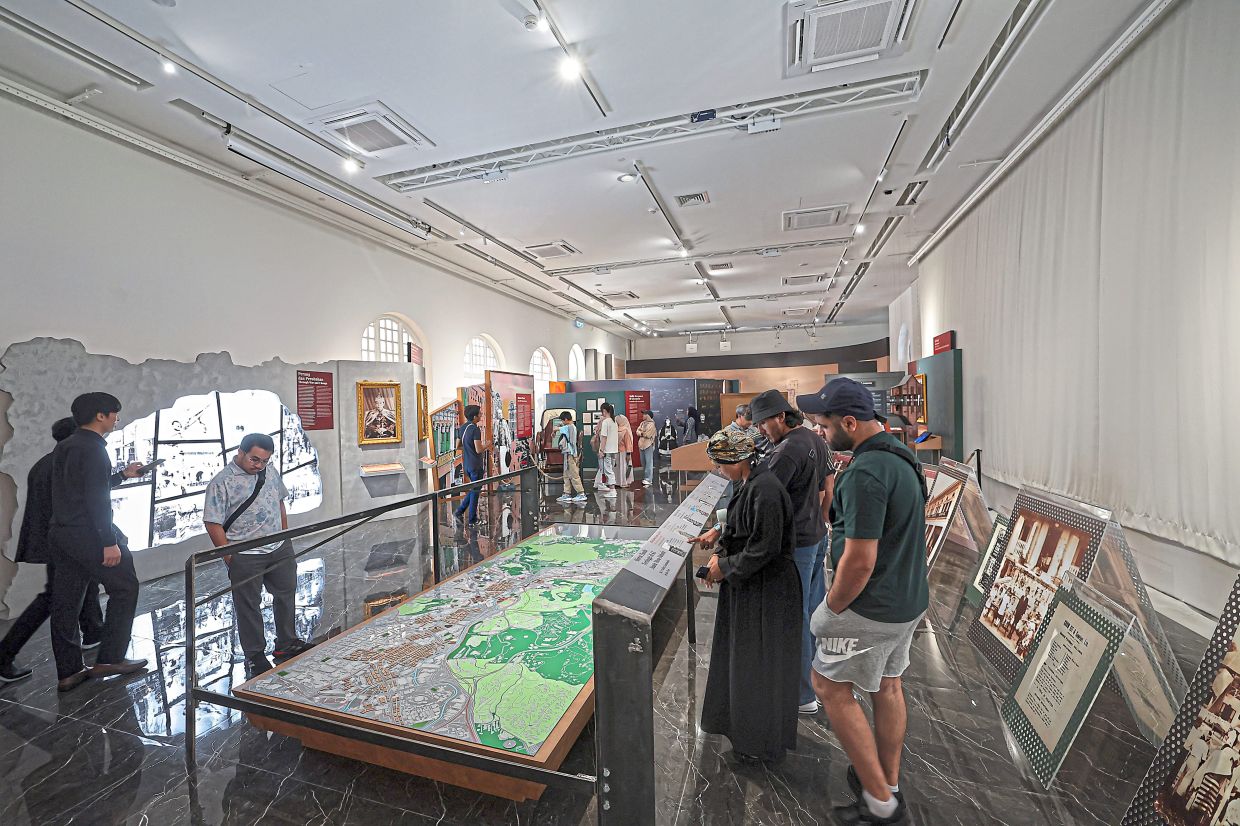 A map charting Kuala Lumpur’s tallest landmarks through the years draws visitors in at the Confluence Hall in BSAS. Photo: Bernama 