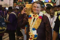 US ambassador carries milk offering up Batu Caves' 272 steps in conjunction with Thaipusam