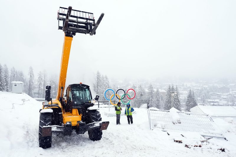 Olympics-First women's downhill training cancelled as heavy snow falls on Cortina