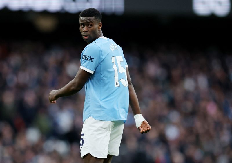 Soccer-Guardiola seeks rule change to make Guehi eligible for League Cup final