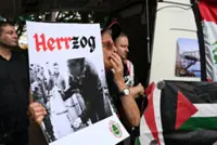 Australia dodges call for arrest of visiting Israel president