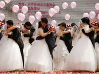US charges 11 over Chinese sham marriages