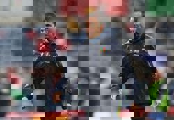 Rugby-Italy reshuffle team for Scotland test as injury toll bites