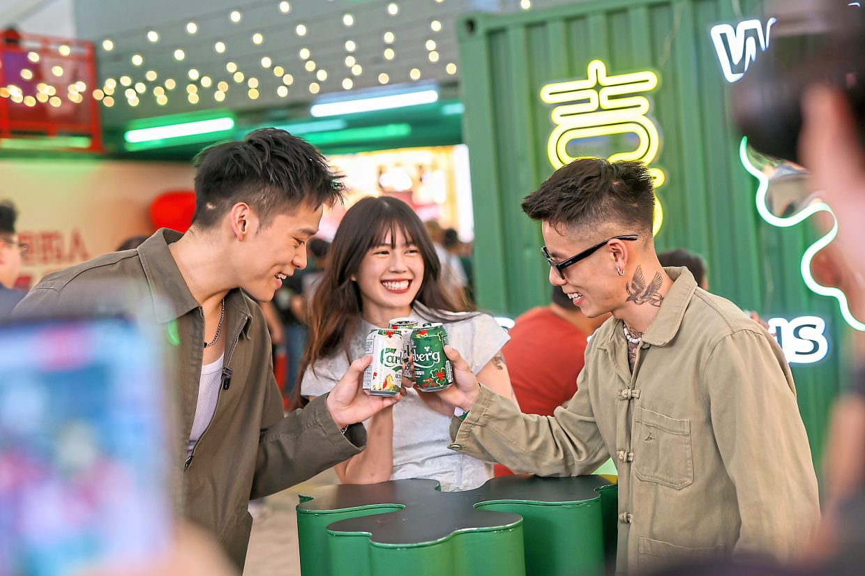 Friends cheering to the festive season at CarlsCrib-CNY edition.