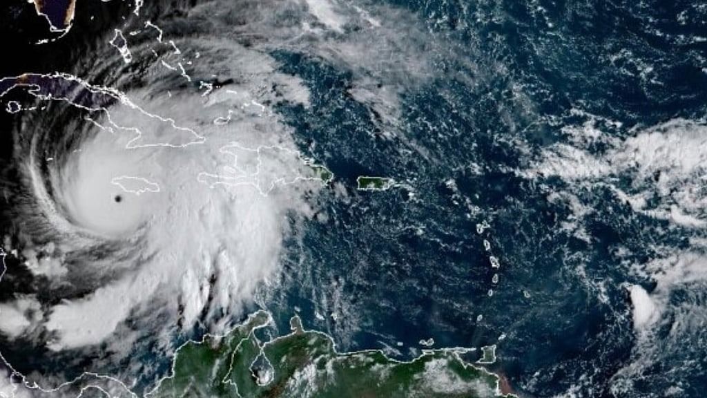 Tropical storm leaves four dead, thousands displaced in Philippines after flooding and a landslide