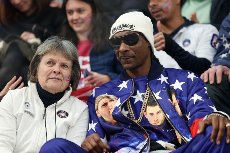 Olympics-Curling-Snoop Dogg in the house: Rapper cheers US to mixed doubles win