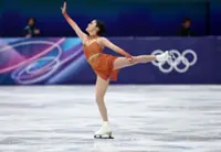 Olympics-Figure Skating-Canada's Schizas shrugs off music issue in team event skate