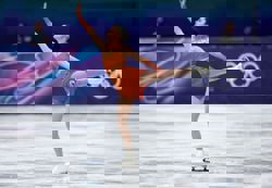 Olympics-Figure Skating-Canada's Schizas shrugs off music issue in team event skate