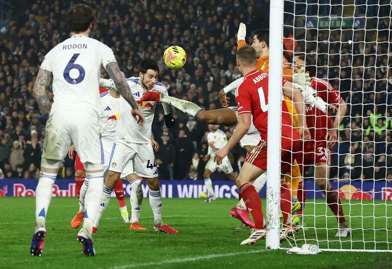 Soccer-Leeds beat Forest 3-1 to move nine points clear of relegation zone