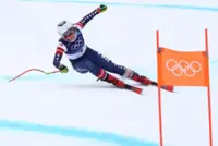 Olympics-Alpine skiing-Johnson fastest, Vonn third in interrupted final training
