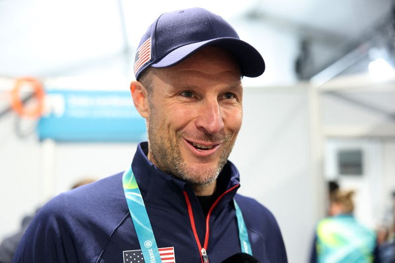 Olympics-Alpine skiing-Turncoat? Svindal's USA jacket catches the eye
