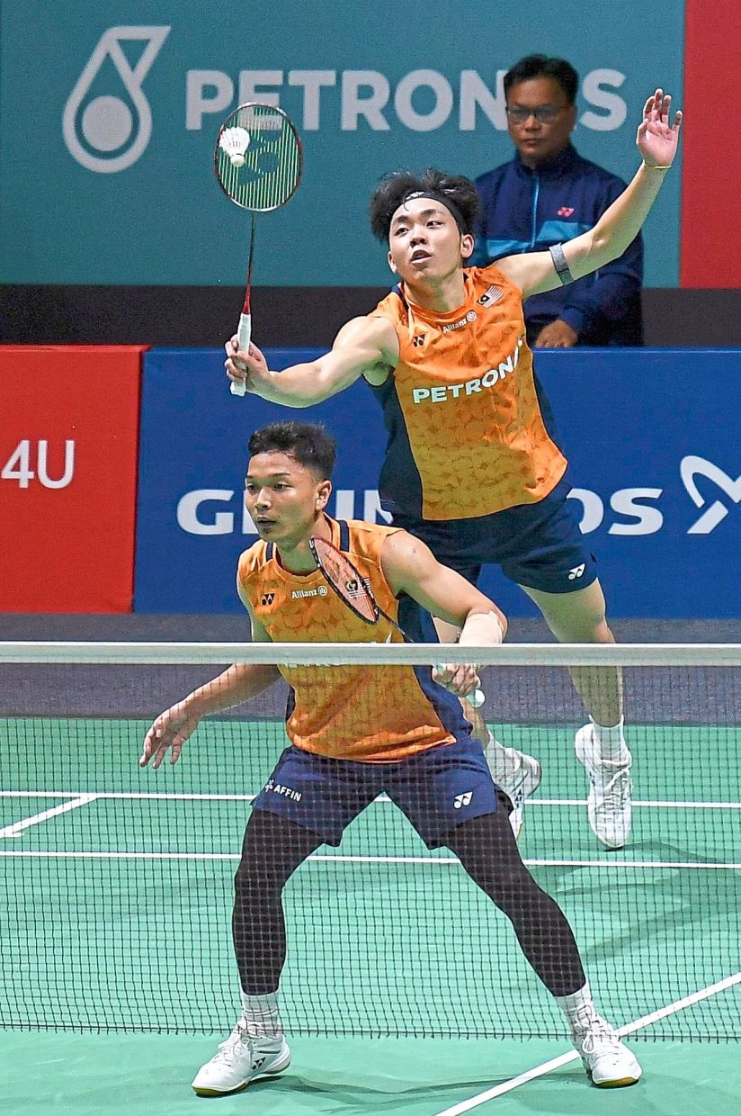 Prove it: Malaysian men’s doubles shuttlers Wan Arif Wan Junaidi (front) and Yap Roy King have two more chances to impress coaches. — IZZRAFIQ ALIAS/The Star 