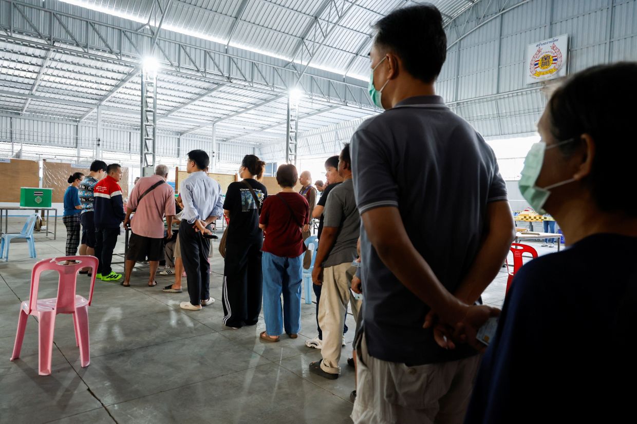 Voters stand in a queue at a polling station to vote in the general election, in Bangkok, Thailand, Feb 8, 2026. - Photo: Reuters