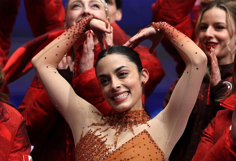 Olympics-Figure skating-Canadian Schizas had good excuse for missing university assignment