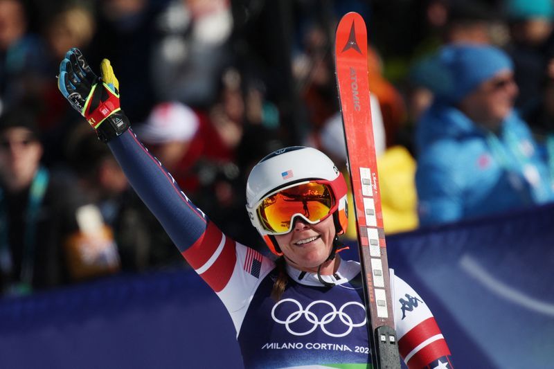 Olympics-Alpine skiing-Johnson wins downhill after big crash for teammate Vonn