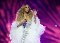 Mariah Carey's Olympic act prompts questions about possible lip-syncing and a curious teleprompter