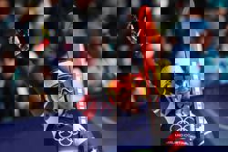 Olympics-Alpine skiing-Johnson wins downhill after big crash for teammate Vonn