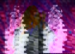 Mariah Carey's Olympic act prompts questions about possible lip-syncing and a curious teleprompter