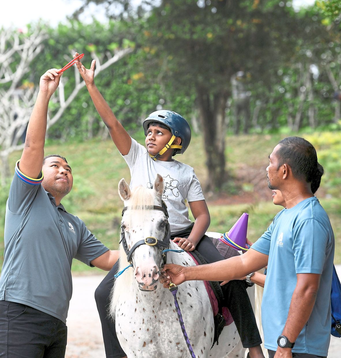 Vharma has spent nearly five years at the centre, where the horses and staff have become his trusted playmates. Photo: The Star/Azhar Mahfof