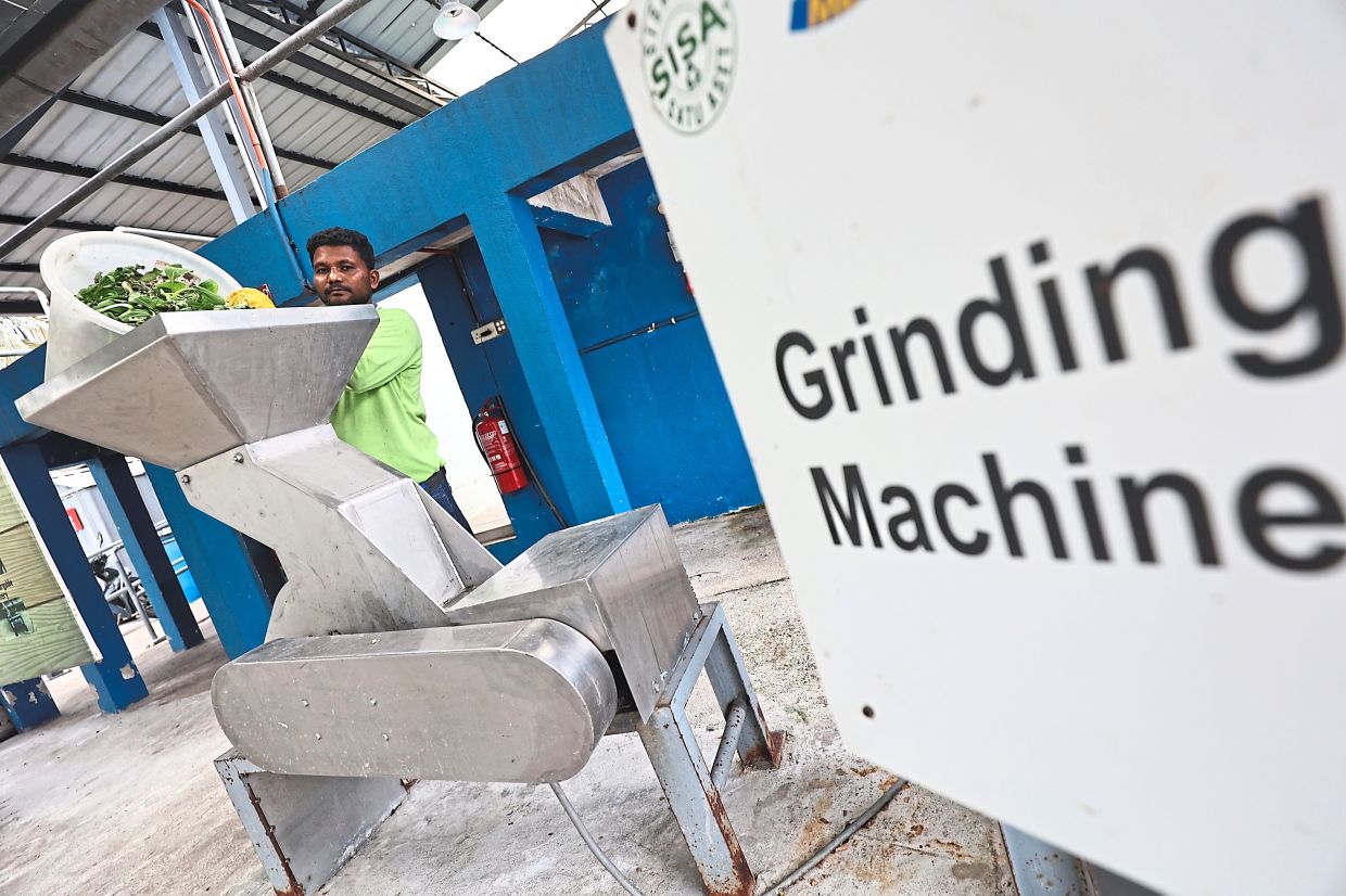 Food waste being ground for composting at Smart PJ Waste Solution Lab.