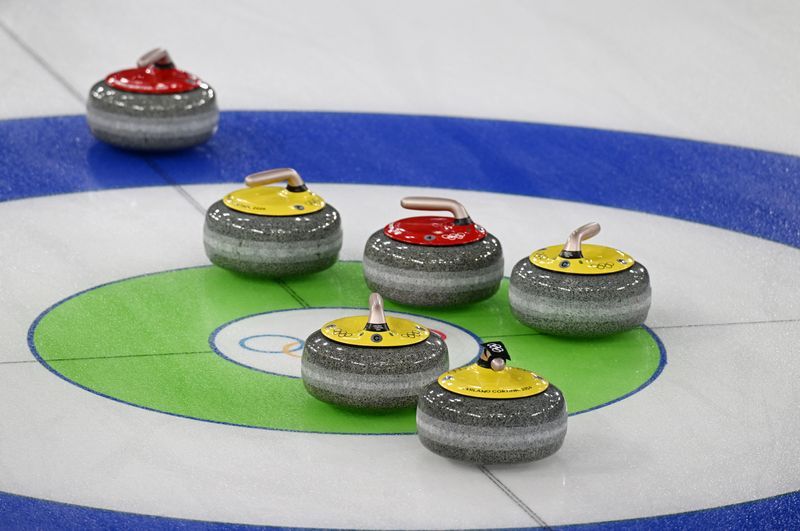 Olympics-Curling-Electronic handles are a hit at Milano Cortina Games