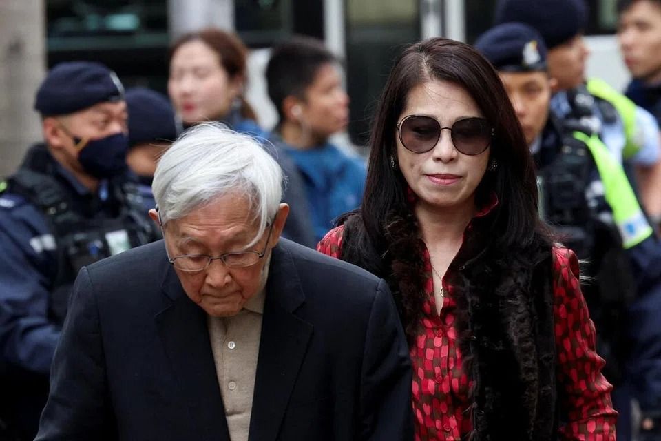 Retired bishop Cardinal Joseph Zen Ze-kiun and Teresa Lai, wife of Jimmy Lai, arriving at the West Kowloon Magistrates' Courts building for the sentencing in the national security collusion trial of Lai on Feb 9. - Reuters