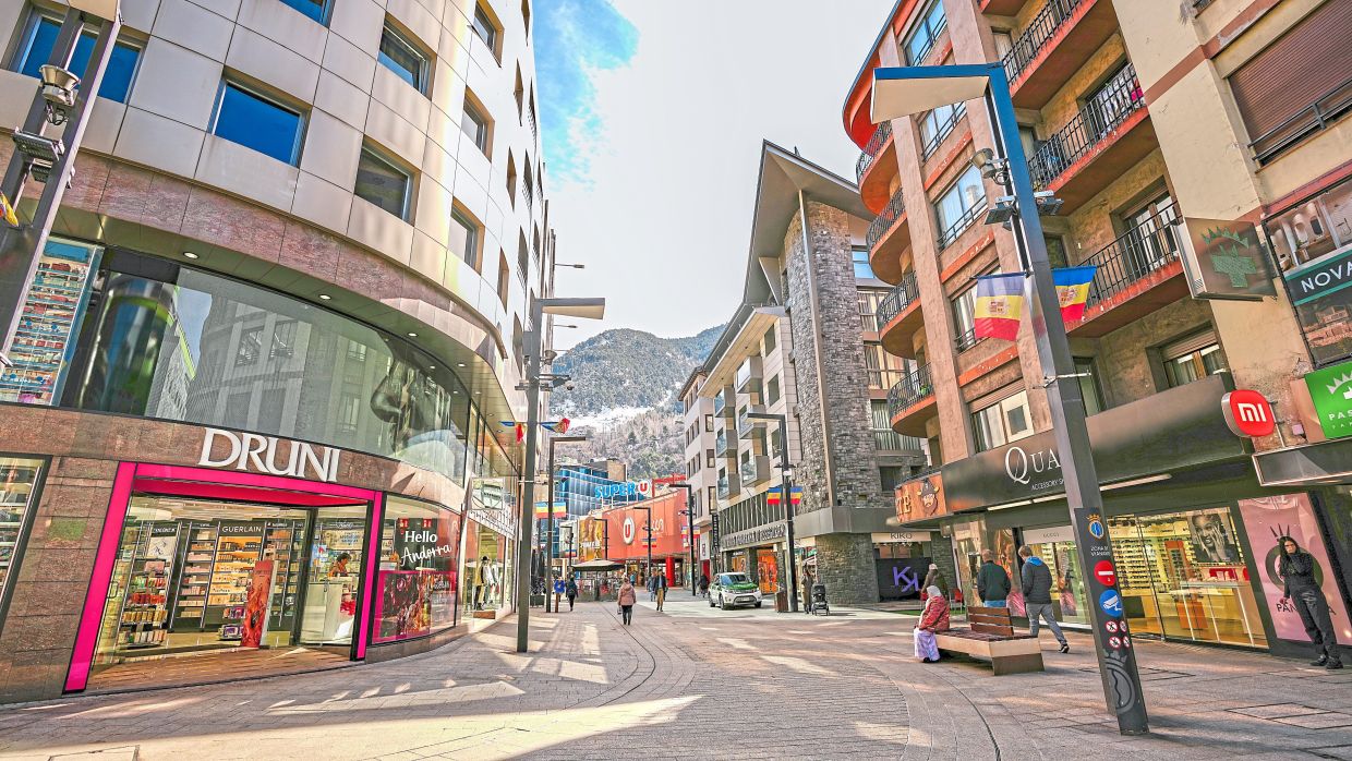 Meritxell Avenue, Andorra la Vella’s main drag, draws shoppers in with its tax-free prices and endless retail temptations. — Andorra Turisme