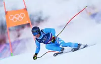 Olympics-Alpine skiing-Franzoni puts Italy on top in men's combined after downhill, Swiss and French lurk