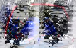 Olympics-Ice Hockey-Italy into quarters with nervy win over Japan