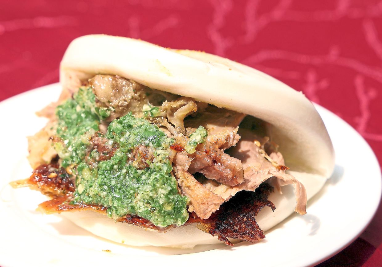 Sichuan Roasted Whole Lamb with Pau is among the highlights from Sunset Terrace’s Chinese New Year buffet spread. — Photos: ART CHEN/The Star