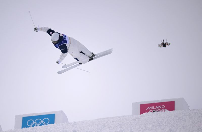 Olympics-Freestyle skiing-Japan's Horishima tops moguls qualifying, Kingsbury and Wallberg also advance
