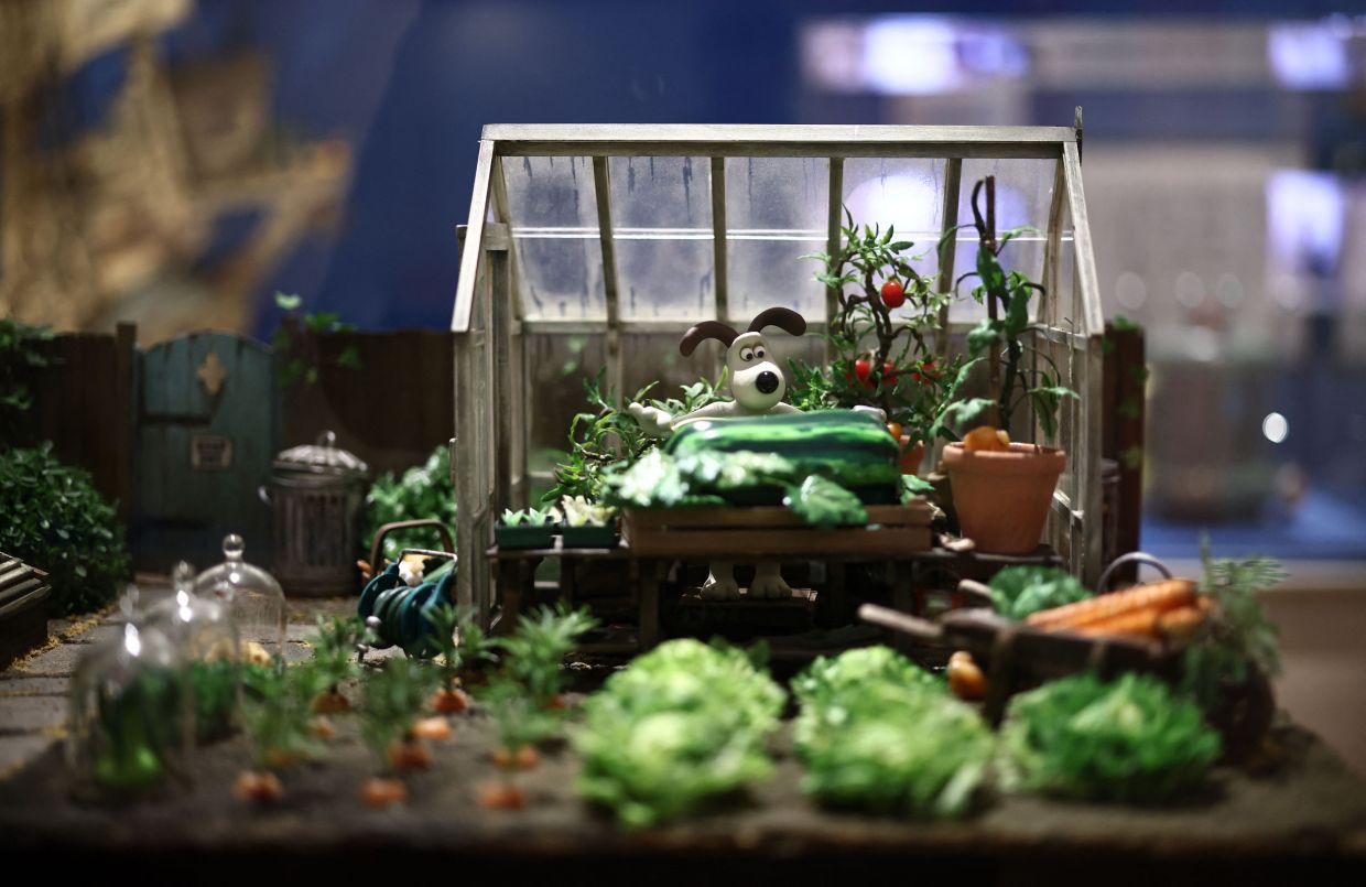 An exhibit featuring the 'Gromit in the Greenhouse' set from 'Wallace & Gromit: The Curse Of The Were-Rabbit' film. Photo: AFP