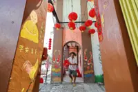 PD sexagenarian spreads CNY cheer by painting murals