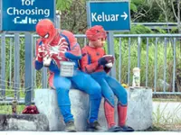 Melaka probing Spider-Man and Spider-Girl