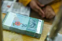 Ringgit opens firmer against US$ on weaker greenback