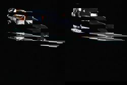 Olympics-Ski Jumping-Germany's Raimund soars to gold, Slovenia's Prevc falls short